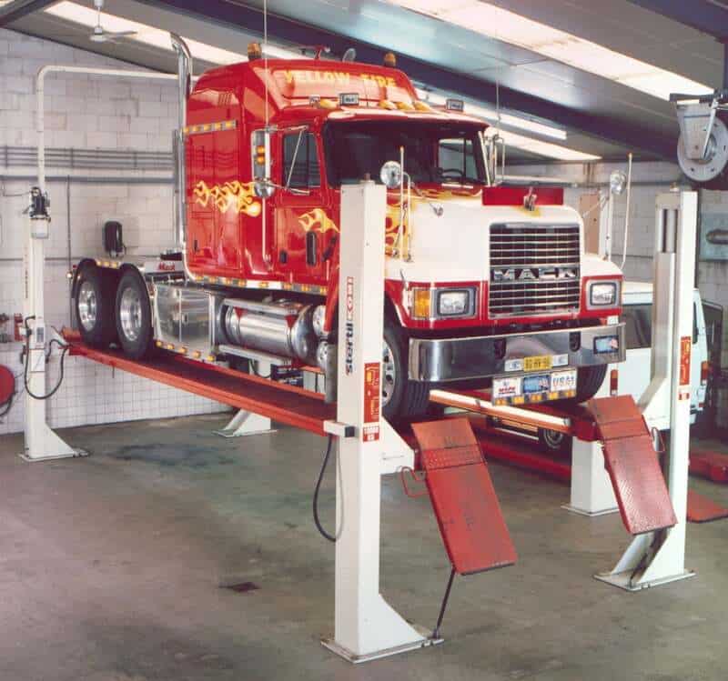 Types-Of-Car-Lifts-Four-Post-Lifts-with-mac-truck-Stertil-Koni-STERTIL